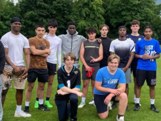 Timi Oke (Pictured in the Middle) surrounded by his Camp attendees, in South London, U.K. June 1st, 2024. Photo Courtesy of Timi Oke